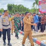 Bupati Basel Pimpin Apel Akbar Linmas Kesiapan Pengamanan Pemilu 2024